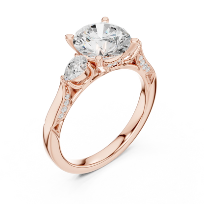 Front view of rose gold round three stone ring with pear side stones, pave accents and lab-grown diamonds – Australia