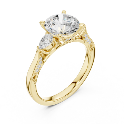 Front view of yellow gold round three stone ring with pear side stones, pave accents and lab-grown diamonds – Australia