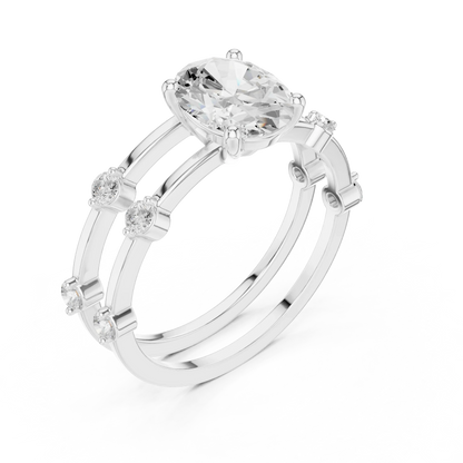 Split shank white gold ring with center oval lab-grown diamond and side stones front view