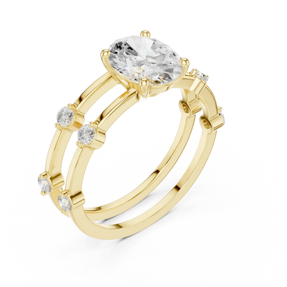 Split shank yellow gold ring with center oval lab-grown diamond and side stones front view