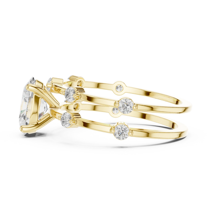 Split shank yellow gold ring with center oval lab-grown diamond and side stones side view