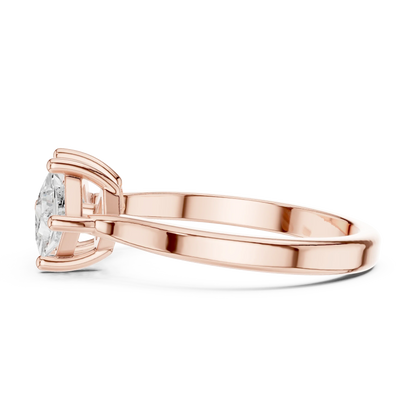 Side view of rose gold Toi et Moi ring highlighting double princess diamond setting