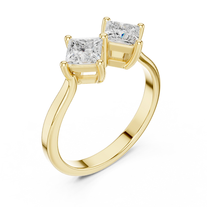 Front view of yellow gold Toi et Moi ring showcasing double princess cut lab-grown diamonds
