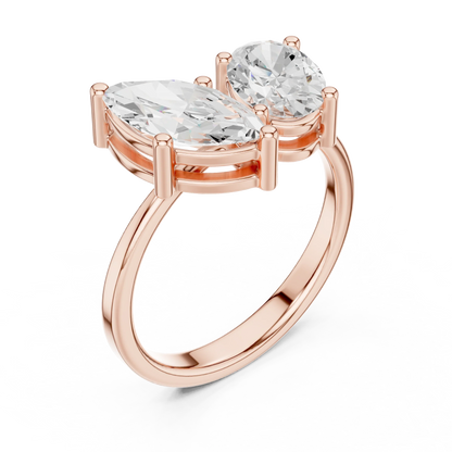 Front view of rose gold Toi et Moi ring featuring marquise and oval lab-grown diamonds