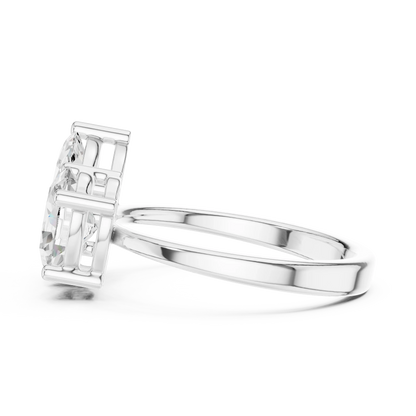 Side view of white gold Toi et Moi ring highlighting marquise and oval diamond setting