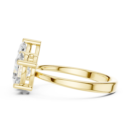 Side profile of yellow gold Toi et Moi ring highlighting marquise and oval diamond setting