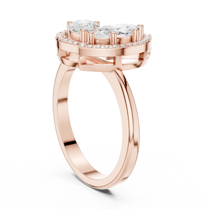 Back view of rose gold Toi et Moi ring with marquise and pear lab-grown diamonds and split shank band