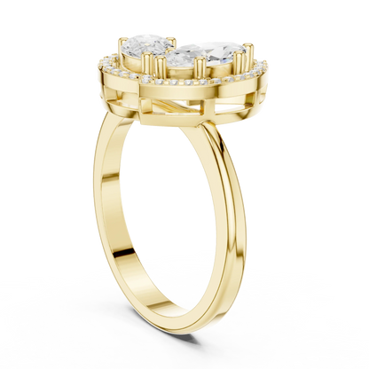 Back view of yellow gold Toi et Moi ring with marquise and pear lab-grown diamonds, pavé halo and split shank band