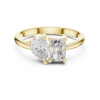 Toi et Moi ring with pear and radiant lab-grown diamonds in yellow gold with classic luxury appeal