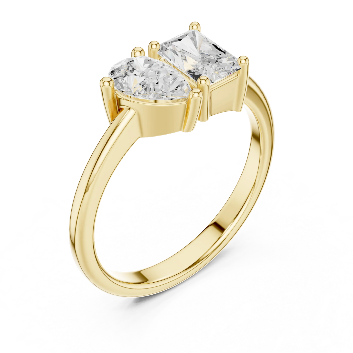 Front view of yellow gold Toi et Moi ring showcasing pear and radiant lab-grown diamonds