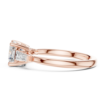 Side profile of rose gold cushion cut diamond trinity ring with three-stone setting