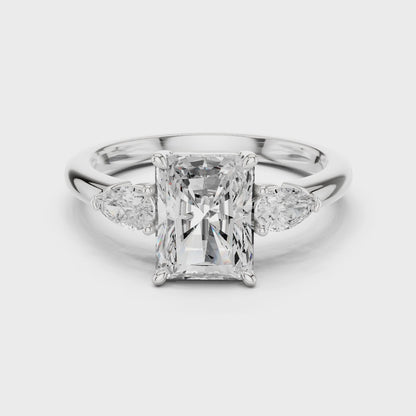 Clarion Radiant Emerald Three-Stone Diamond Ring